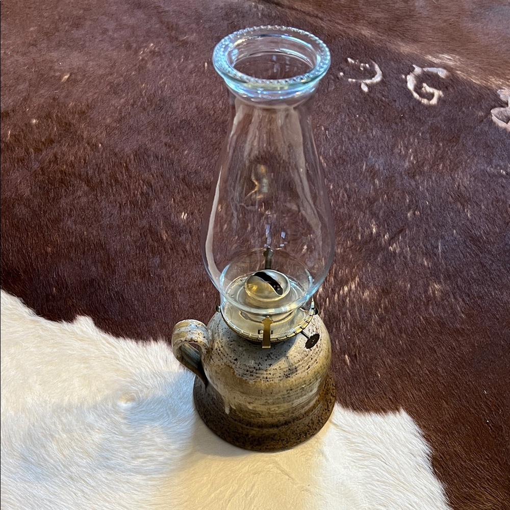 Signed Stoneware Pottery oil lamp—a handmade ceramic base fitted with a glass